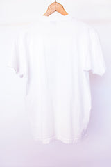 short sleeve white vintage 1989 t-shirt with grand prix of dallas race car graphic on front