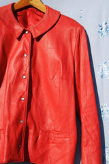 long sleeve red leather jacket with popper buttons and peter pan collar vintage 1970's