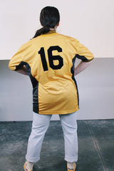 Women's or men's vintage 1970's Cannon, Made in USA label short sleeve sports jersey in brown and yellow with white pin stripes.