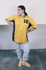 Women's or men's vintage 1970's Cannon, Made in USA label short sleeve sports jersey in brown and yellow with white pin stripes.