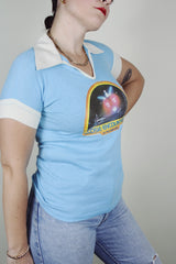 short sleeve baby blue Close Encounters 1978 graphic tee with white trim on cuffs and collar