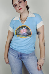 short sleeve baby blue Close Encounters 1978 graphic tee with white trim on cuffs and collar
