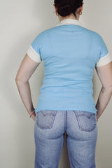 short sleeve baby blue Close Encounters 1978 graphic tee with white trim on cuffs and collar