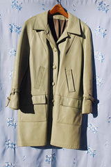 pastel green long sleeve leather jacket buttons up the front and collar 1960's vintage