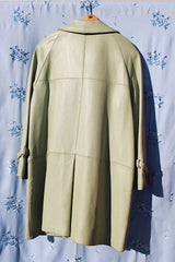 pastel green long sleeve leather jacket buttons up the front and collar 1960's vintage
