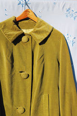 long sleeve pea green velvet tent coat with pockets and three button closure women's vintage 1950's