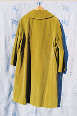 long sleeve pea green velvet tent coat with pockets and three button closure women's vintage 1950's