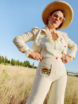 cream long sleeve blouse with ruffle trim neckline and cuffs vintage 1970's