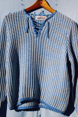 long sleeve baby blue and white crochet sweater with a tie front vintage 1970's