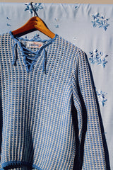 long sleeve baby blue and white crochet sweater with a tie front vintage 1970's