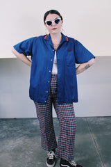 Women's or men's vintage 1970's Hilton, Made in USA label short sleeve navy blue button up bowling shirt with ribbed striped collar and embroidery on the front and back.