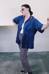 Women's or men's vintage 1970's Hilton, Made in USA label short sleeve navy blue button up bowling shirt with ribbed striped collar and embroidery on the front and back.