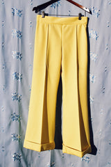 vintage yellow polyester pants with flair and front pleat stretch waistband