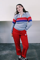 Women's vintage 1990's Canterbury of New Zealand label long sleeve cotton polyester blend material grey t-shirt with small white collar, half button closure and a red, pink, and blue stripes across chest.