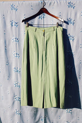 vintage high waisted pencil skirt with matching belt and front pockets in seafoam green