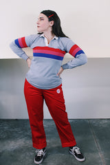 Women's vintage 1990's Canterbury of New Zealand label long sleeve cotton polyester blend material grey t-shirt with small white collar, half button closure and a red, pink, and blue stripes across chest.