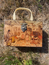 box purse with white marble panels and one side with painting plastic handle and green velvet interior vintage 1960's