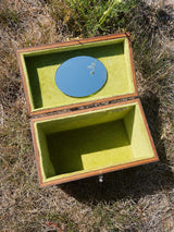 box purse with white marble panels and one side with painting plastic handle and green velvet interior vintage 1960's