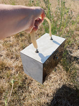 box purse with white marble panels and one side with painting plastic handle and green velvet interior vintage 1960's