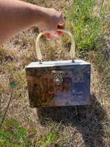 box purse with white marble panels and one side with painting plastic handle and green velvet interior vintage 1960's