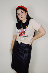 short sleeve light tan cotton t-shirt with Smiler Ariola Records graphic on the front 1970's