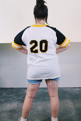 Women's or men's vintage 1980's Willamette Athletic, Portland short sleeve white, yellow, and black mesh stretch nylon sports jersey with v shaped neckline.