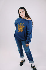 long sleeve navy crew neck sweater with yellow felt UCL logo on front vintage 1970's