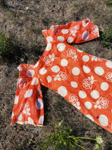 long sleeve bell sleeve orange cotton maxi dress with cream floral and polka dot print vintage 1960's