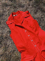 sleeveless red romper in cotton buttons up the front pointy collar vintage 1970's