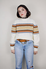 vintage 1970's JCPenney long sleeve white cable knit pullover sweater with abstract print around the chest