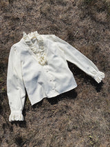 cream long sleeve blouse with ruffle trim neckline and cuffs vintage 1970's