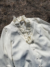 cream long sleeve blouse with ruffle trim neckline and cuffs vintage 1970's