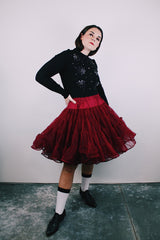 long sleeve black button up cardigan with pearl and diamond embellishments all over vintage 1960's