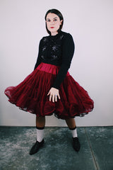 long sleeve black button up cardigan with pearl and diamond embellishments all over vintage 1960's