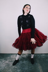 long sleeve black button up cardigan with pearl and diamond embellishments all over vintage 1960's