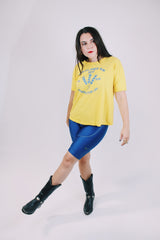 short sleeve yellow cotton vintage t-shirt from 1982 with graphic on front