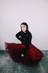 long sleeve black button up cardigan with pearl and diamond embellishments all over vintage 1960's