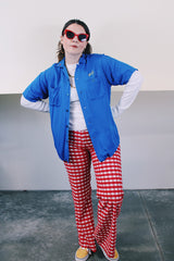 Men's or women's vintage 1960's King Louie by Holiday short sleeve bright blue button up bowling shirt with small collar, two chest pockets, and embroidery in yellow throughout.