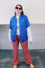 Men's or women's vintage 1960's King Louie by Holiday short sleeve bright blue button up bowling shirt with small collar, two chest pockets, and embroidery in yellow throughout.