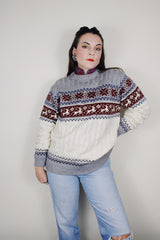 vintage 1980's High Sierra Mervyn's long sleeve cable knit pullover print with a reindeer print across the chest. White with grey, maroon, and navy print.