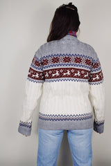 vintage 1980's High Sierra Mervyn's long sleeve cable knit pullover print with a reindeer print across the chest. White with grey, maroon, and navy print.