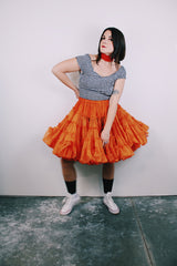vintage 1960's orange crinoline with layers of sheer ruffled tulle