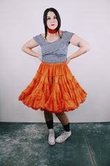 vintage 1960's orange crinoline with layers of sheer ruffled tulle