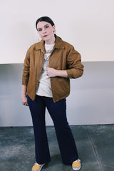 Women's or men's vintage 1980's Sir Jac label long sleeve brown Nylon zip up windbreaker jacket with cotton liner, pockets, and a pointy collar.