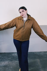 Women's or men's vintage 1980's Sir Jac label long sleeve brown Nylon zip up windbreaker jacket with cotton liner, pockets, and a pointy collar.