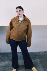 Women's or men's vintage 1980's Sir Jac label long sleeve brown Nylon zip up windbreaker jacket with cotton liner, pockets, and a pointy collar.