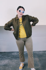 Women's or men's vintage 1970's JCPenney label long sleeve brown colored zip up station jacket in polyester and cotton material. Has collar and pockets.