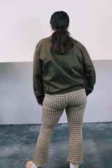 Women's or men's vintage 1970's JCPenney label long sleeve brown colored zip up station jacket in polyester and cotton material. Has collar and pockets.