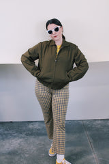 Women's or men's vintage 1970's JCPenney label long sleeve brown colored zip up station jacket in polyester and cotton material. Has collar and pockets.