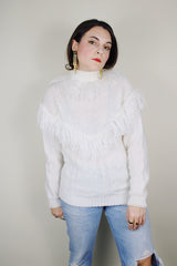 Women's vintage 1980's Avon Fashions label long sleeve white acrylic material pullover turtleneck sweater with fringe trim